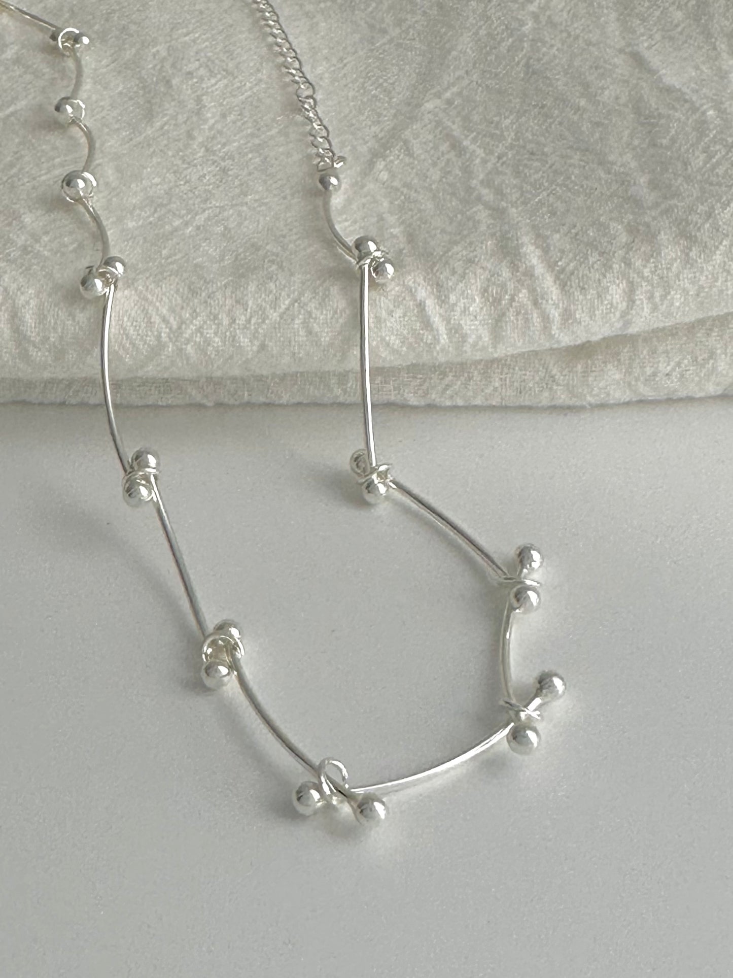 Crossed Bead Necklace